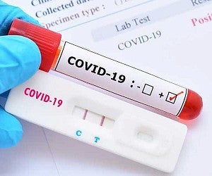 Vial marked COVID-19